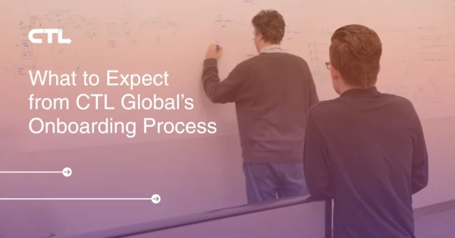 CTL team at a whiteboard working on a Client on-boarding project.